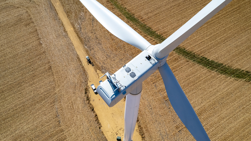 close up shot of wind turbine on a wind farm