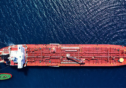 birds eye view of gas tanker with bunker barge at sea