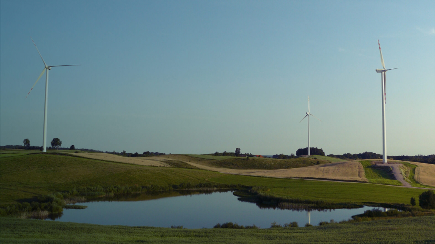 Wind turbines in field